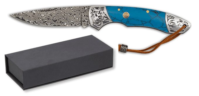 Couteau  DAMASCUS  résine bleu  lame de 7.50 cm